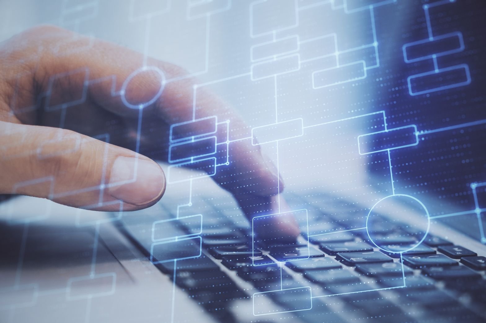 Close-up of a hand typing on a keyboard with overlaid flowchart diagrams, representing software solution testing and digital workflow processes